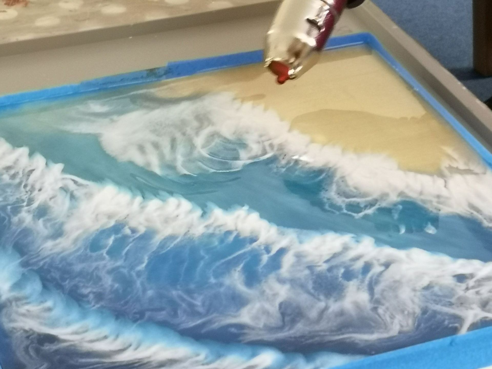 Resin introduction course and mixed media, making a beach and waves with resin. Seascape resin workshop.