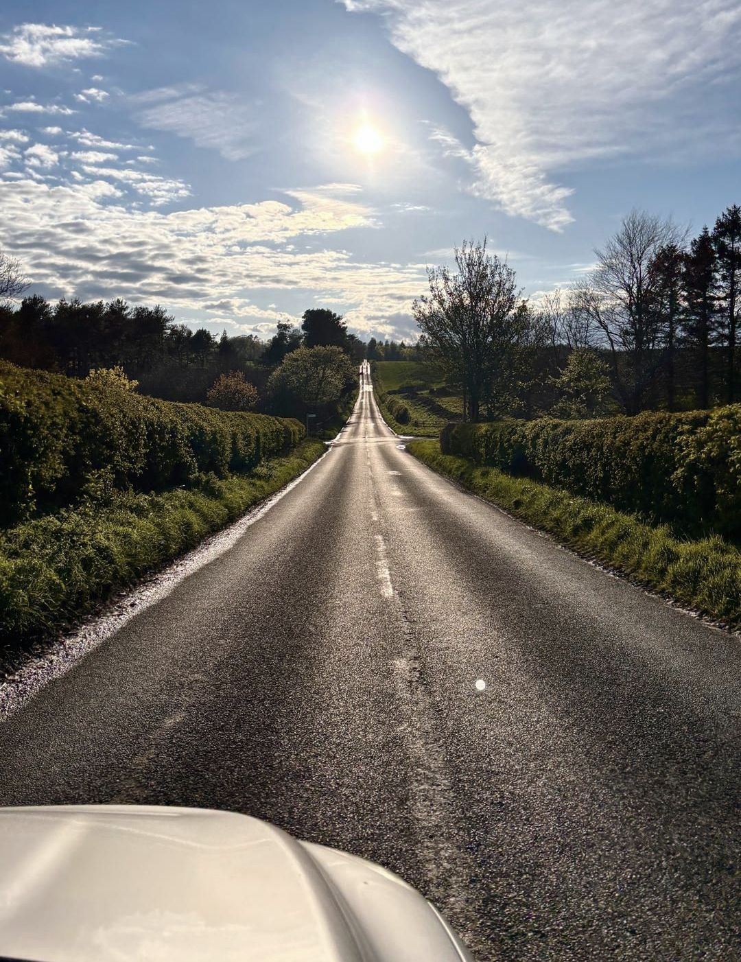 A road into the distance. Where will you drive today? R3 Cars