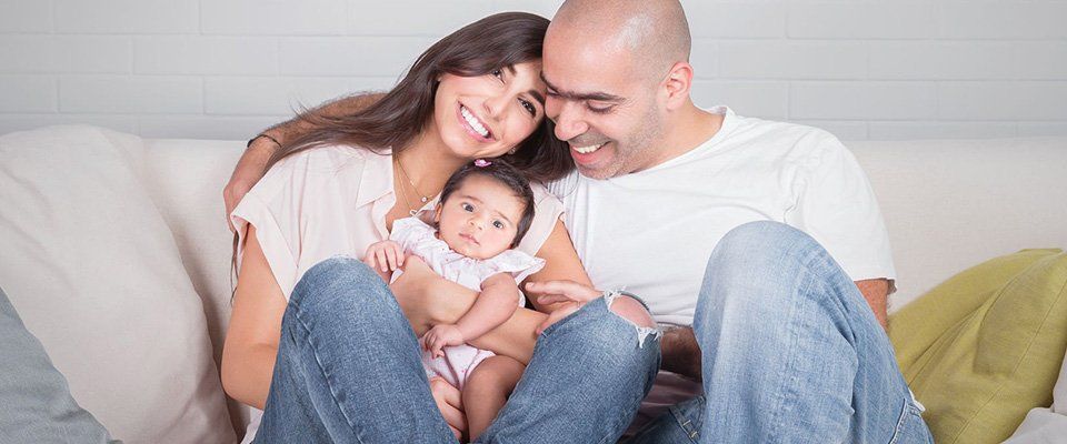 nouveaux parents avec bébé