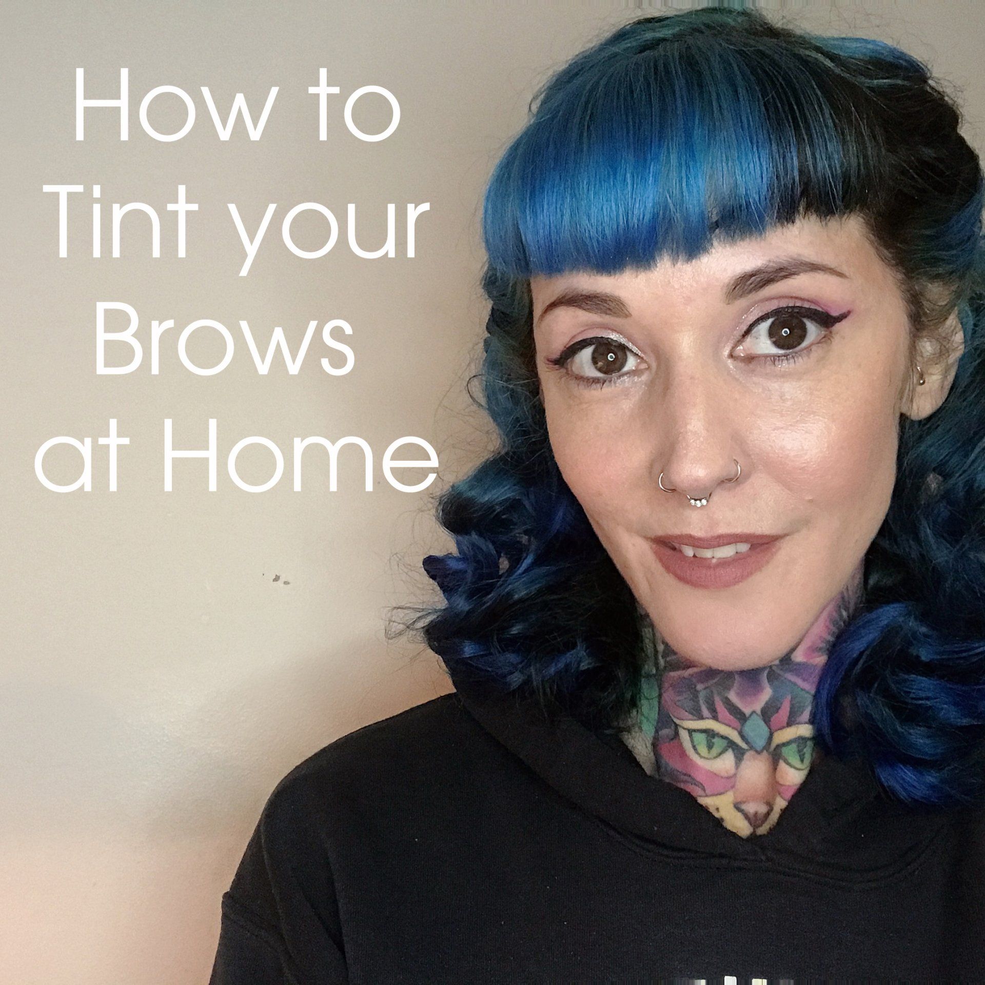 Woman with blue hair and neck tattoos alog the title ''How to Tint your Brows at Home''