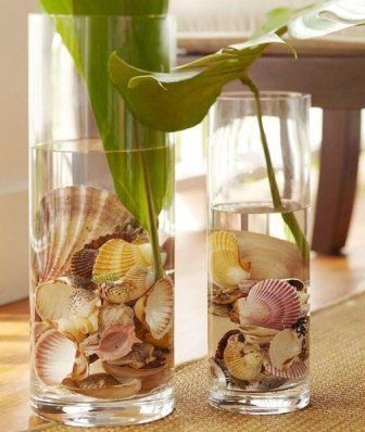 decoracion jarron cristal Con conchas