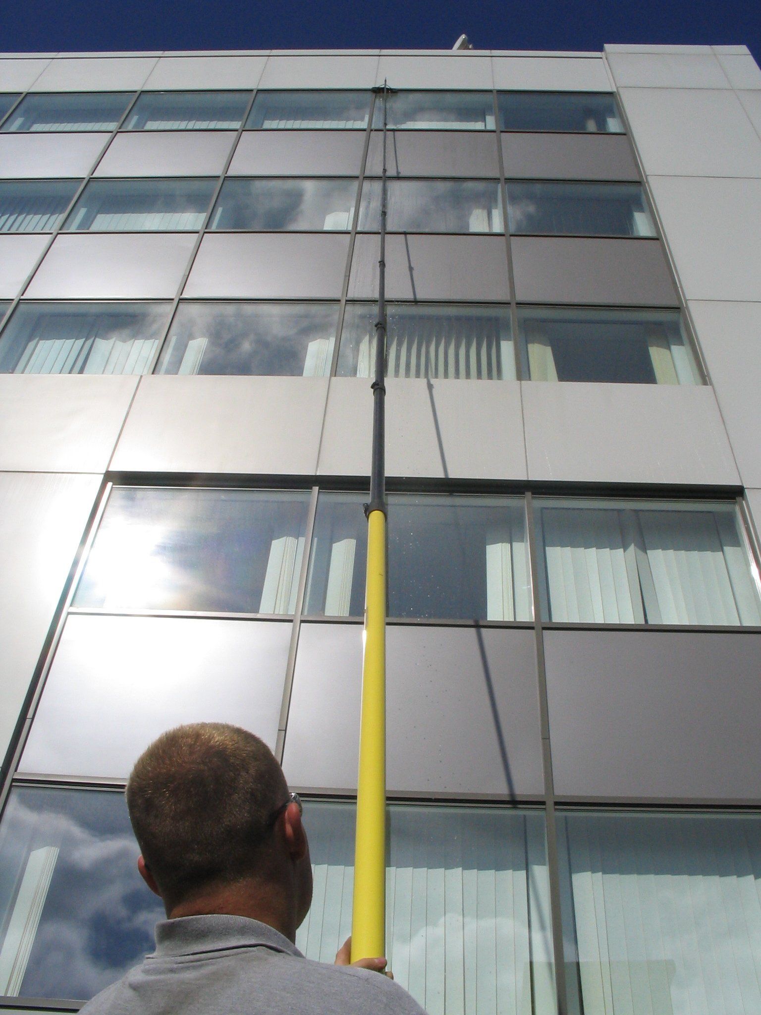 Commercial water fed pole window cleaning